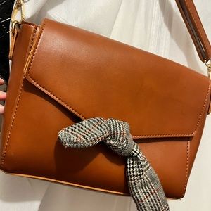 Bow cross body
